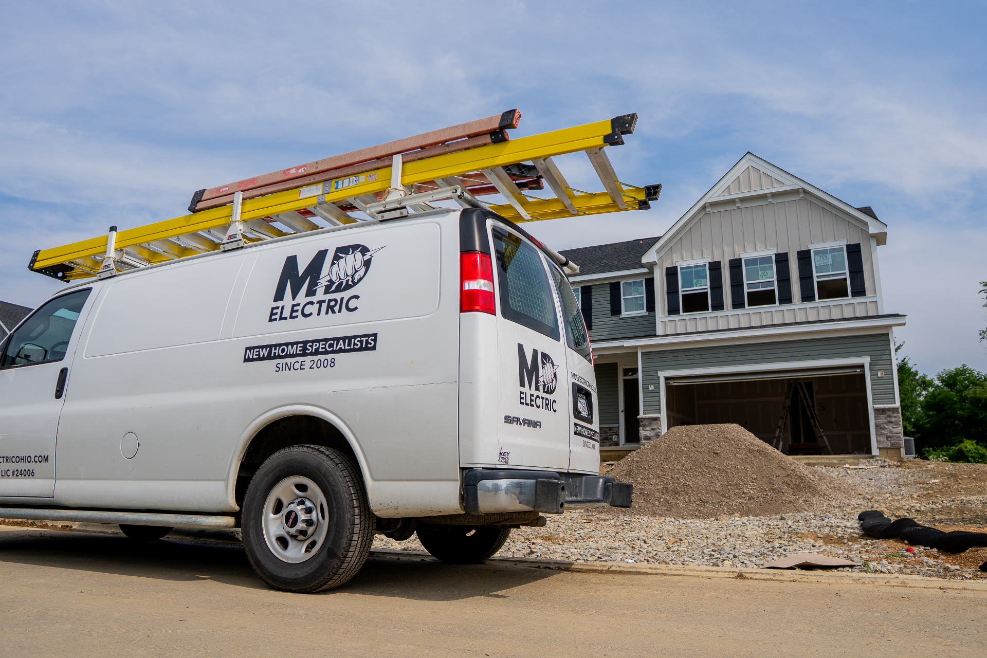 MD Electric technician working on a modern smart electrical panel